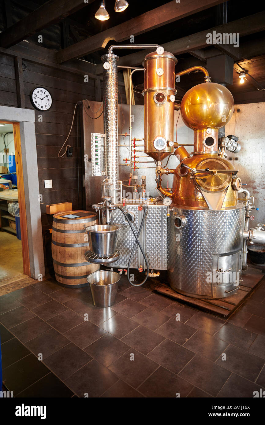 Ancora lavorando in Lunenburg distilleria, Lunenburg, Porto, Nova Scotia, Canada Foto Stock