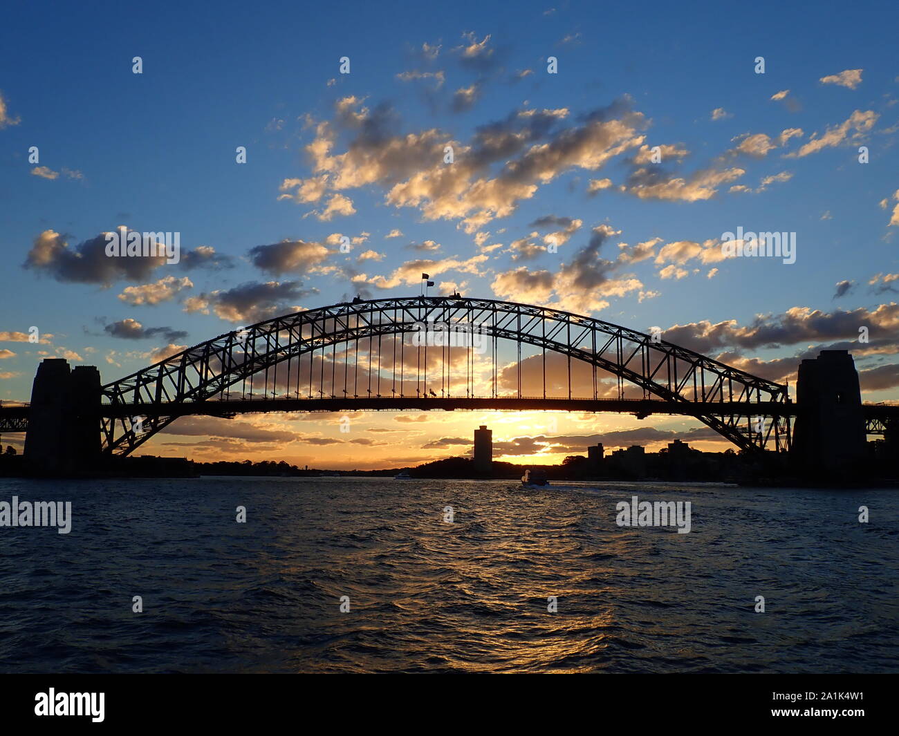 Il Porto di Sydney Harbour Bridge Tramonto Foto Stock