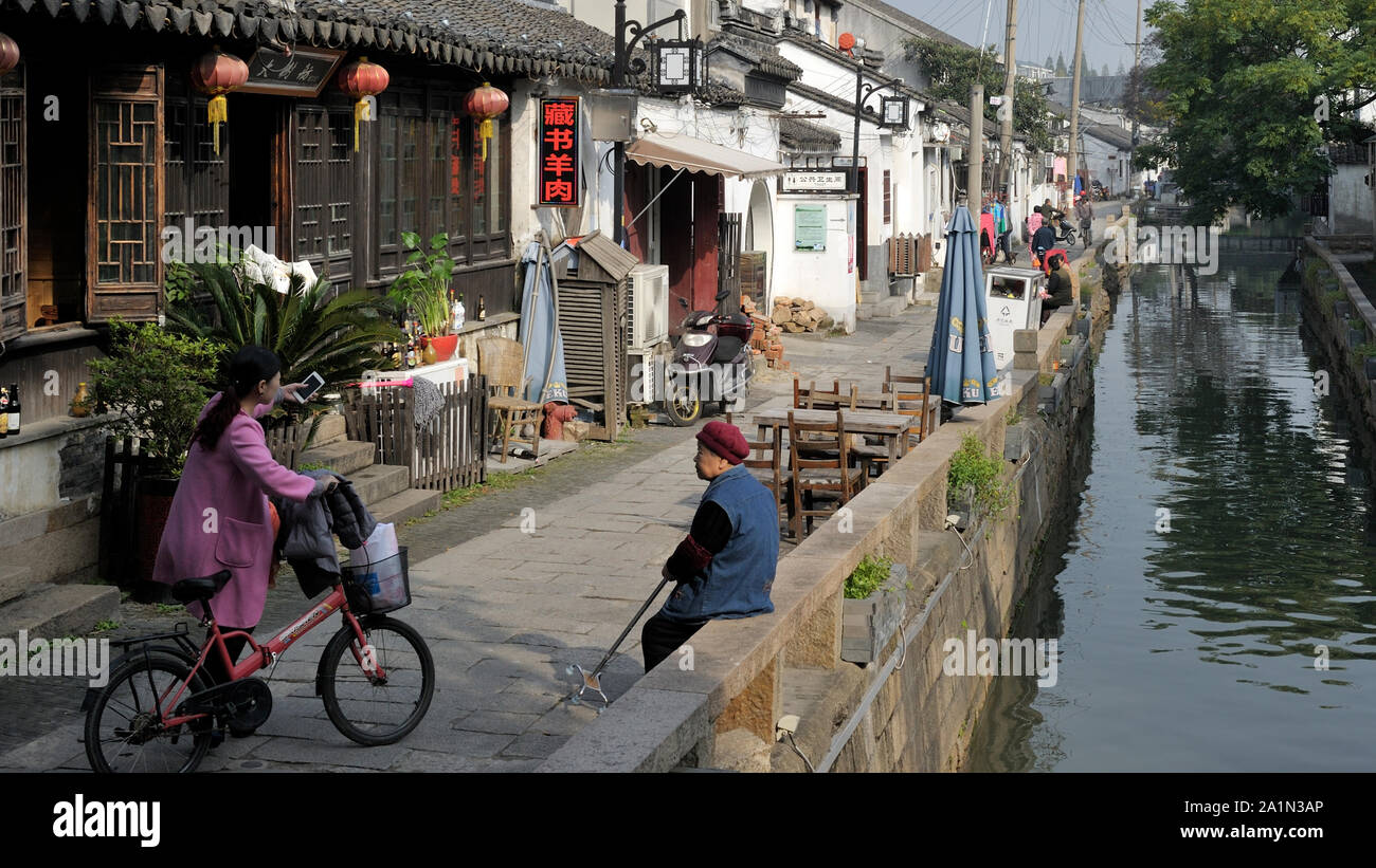 Le generazioni (Suzhou, città vecchia, Cina). Foto Stock