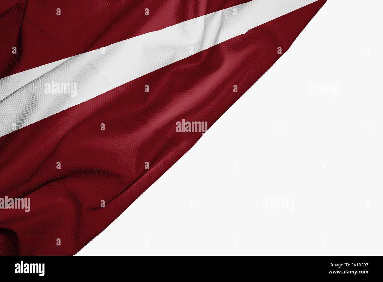 Bandiera della Lettonia di tessuto con copyspace per il testo su sfondo bianco Foto Stock