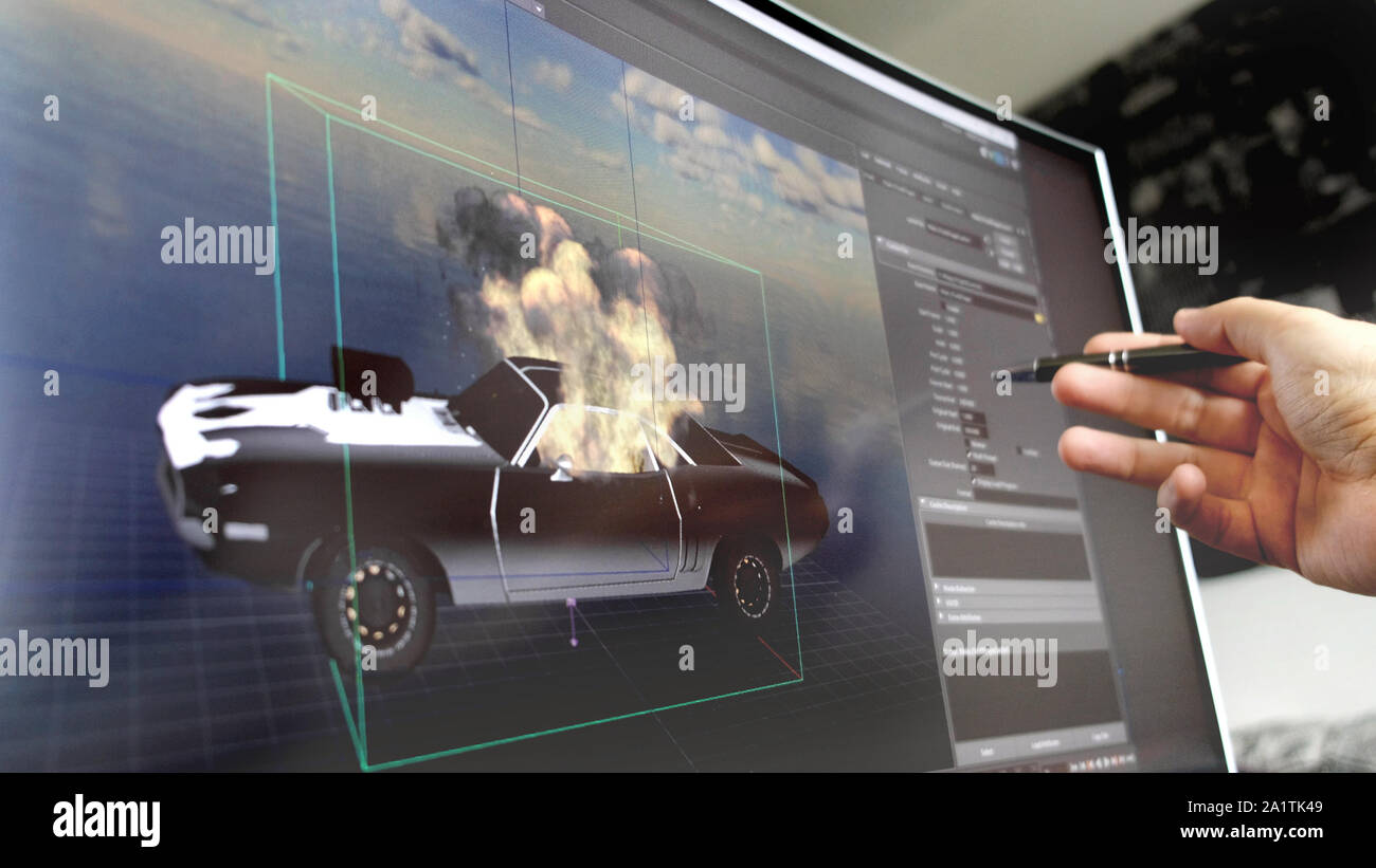 Il design del gioco software della mano con la penna spiegare come progettare auto modello per il videogioco sullo schermo Foto Stock