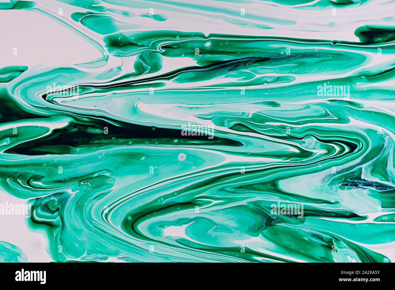 Il liquido l'arte astratta. Texture in marmo di colore verde. Texture astratta di liquido acrilico. Foto Stock
