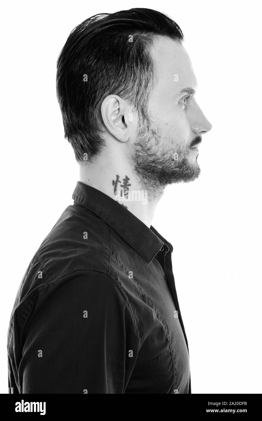 Ritratto di uomo con collo tattoo con testo significato passione Foto stock  - Alamy