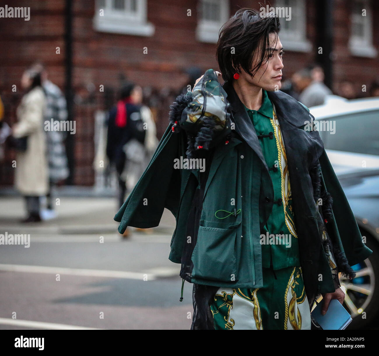 LONDON, Regno Unito - 16 Febbraio 2019: Yu Masui sulla strada durante la London Fashion Week. Foto Stock