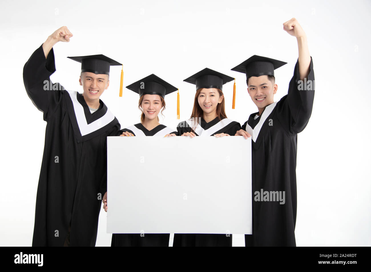 Gruppi di giovani studenti laureati presentazione vuota banne Foto Stock