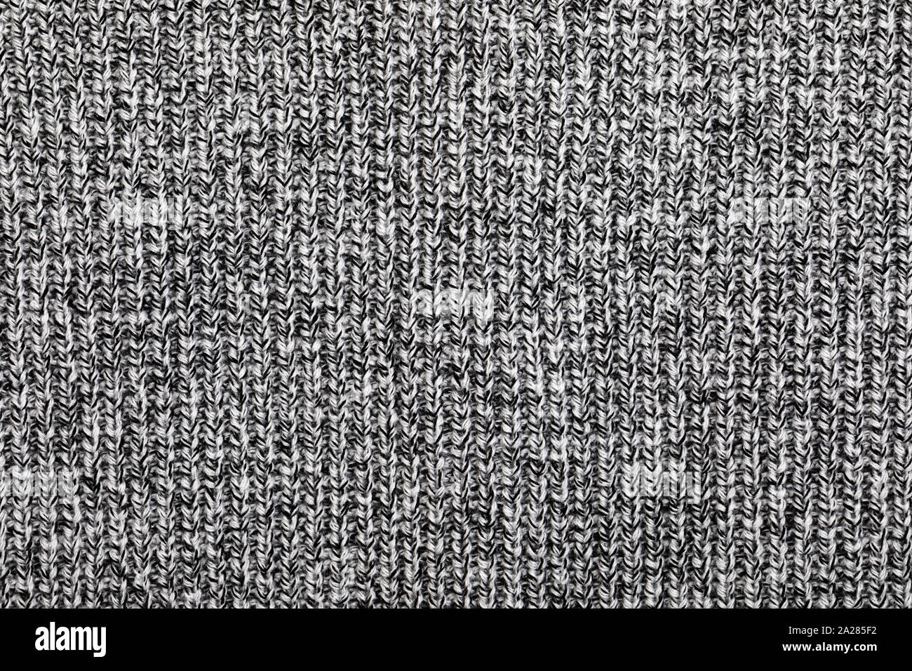 Grigio Melange tessuto a maglia realizzato di erica filato misto sfondo testurizzata Foto Stock