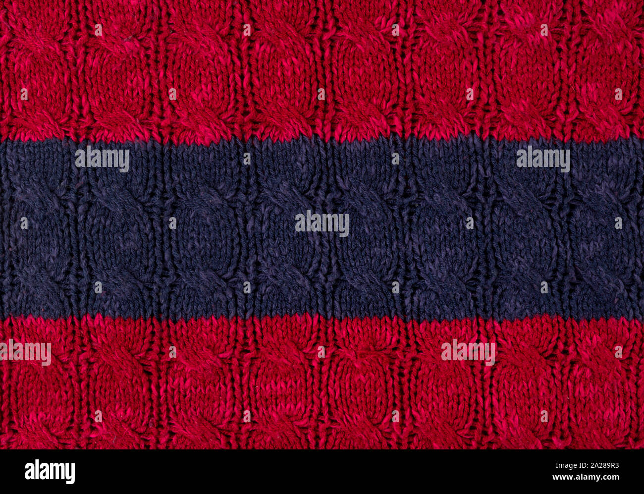 Texture di vinoso con blu di tessuto a maglia stretta verso l'alto. Maglia di lana Foto Stock