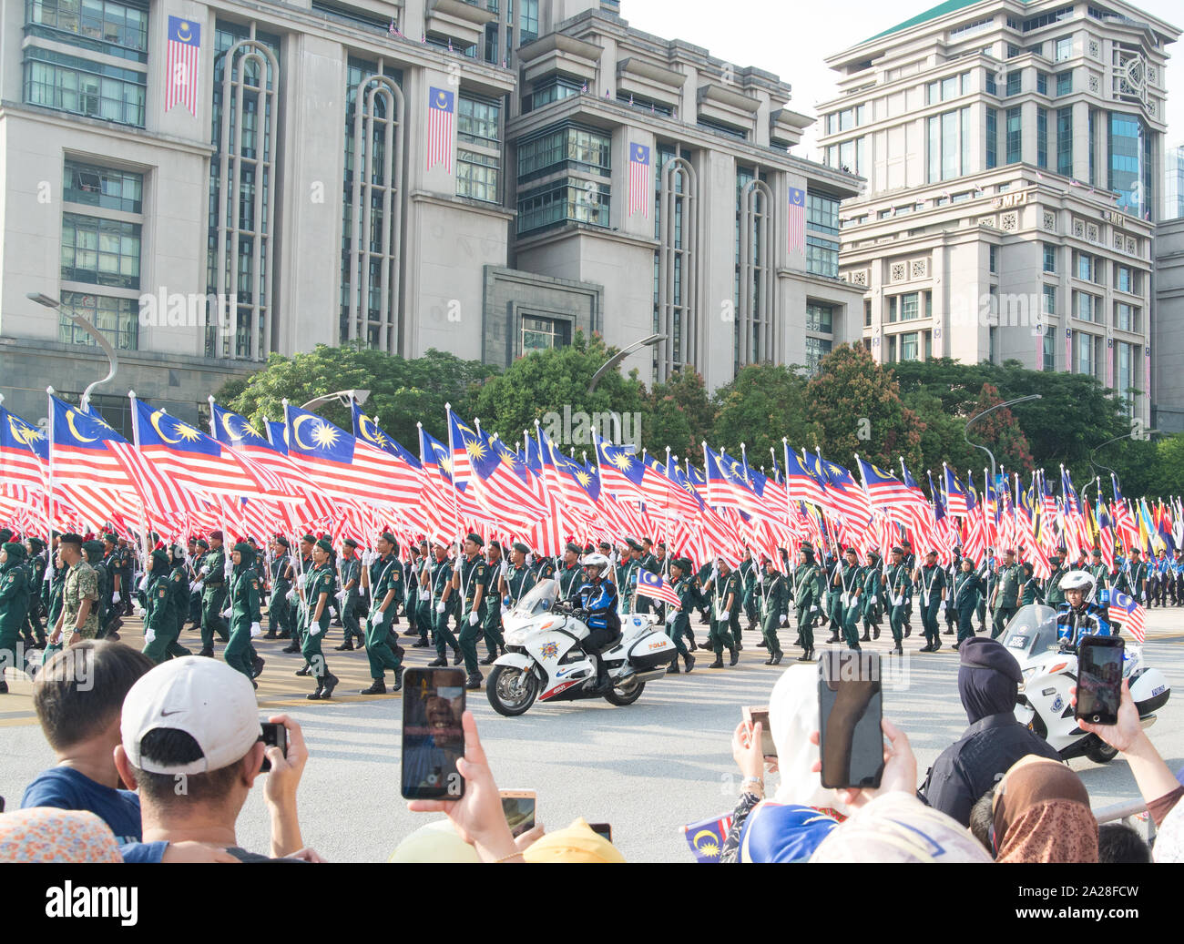 31 Agosto 2019: malese armati contingente forzata marciando al 62o giorno di indipendenza o Merdeka Day celebrazione della Malesia in Putrajaya. Foto Stock