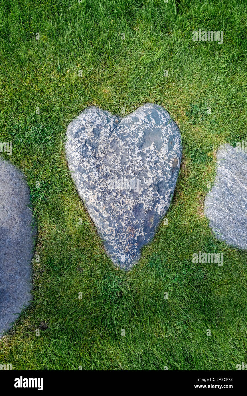 Pietra da passo a forma di cuore Foto Stock