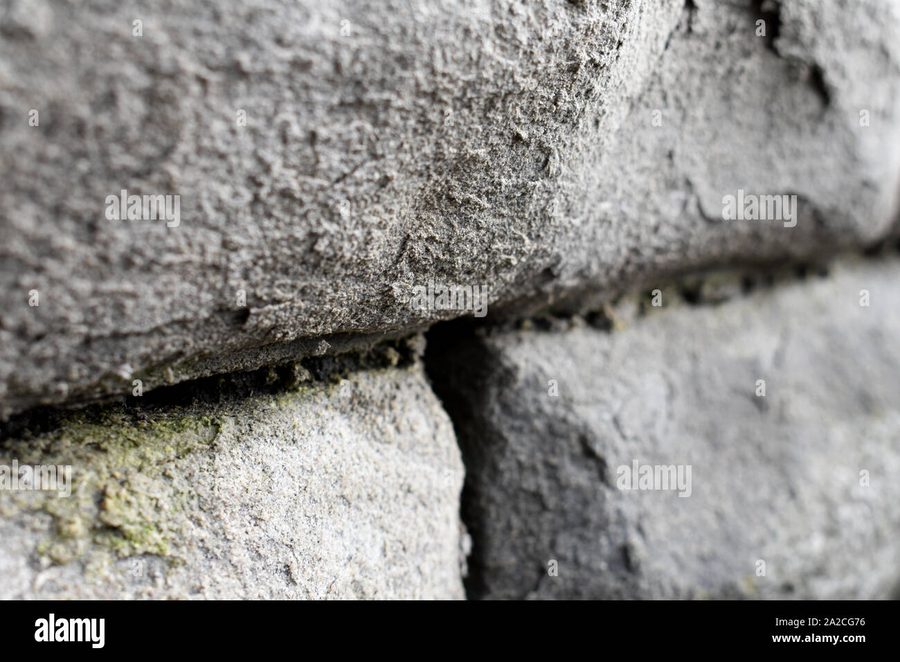 Dettaglio di un muro di pietra Foto Stock