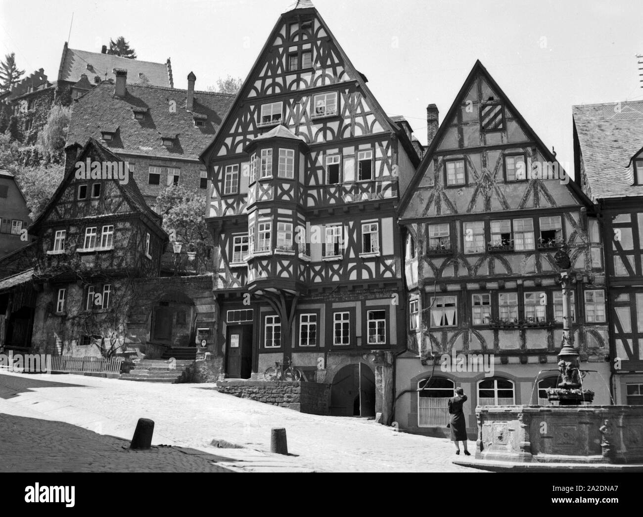 Alte Fachwerkhäuser in Miltenberg, Deutschland 1930er Jahre. Vecchie case con travi di legno a Miltenberg, Germania 1930s. Foto Stock