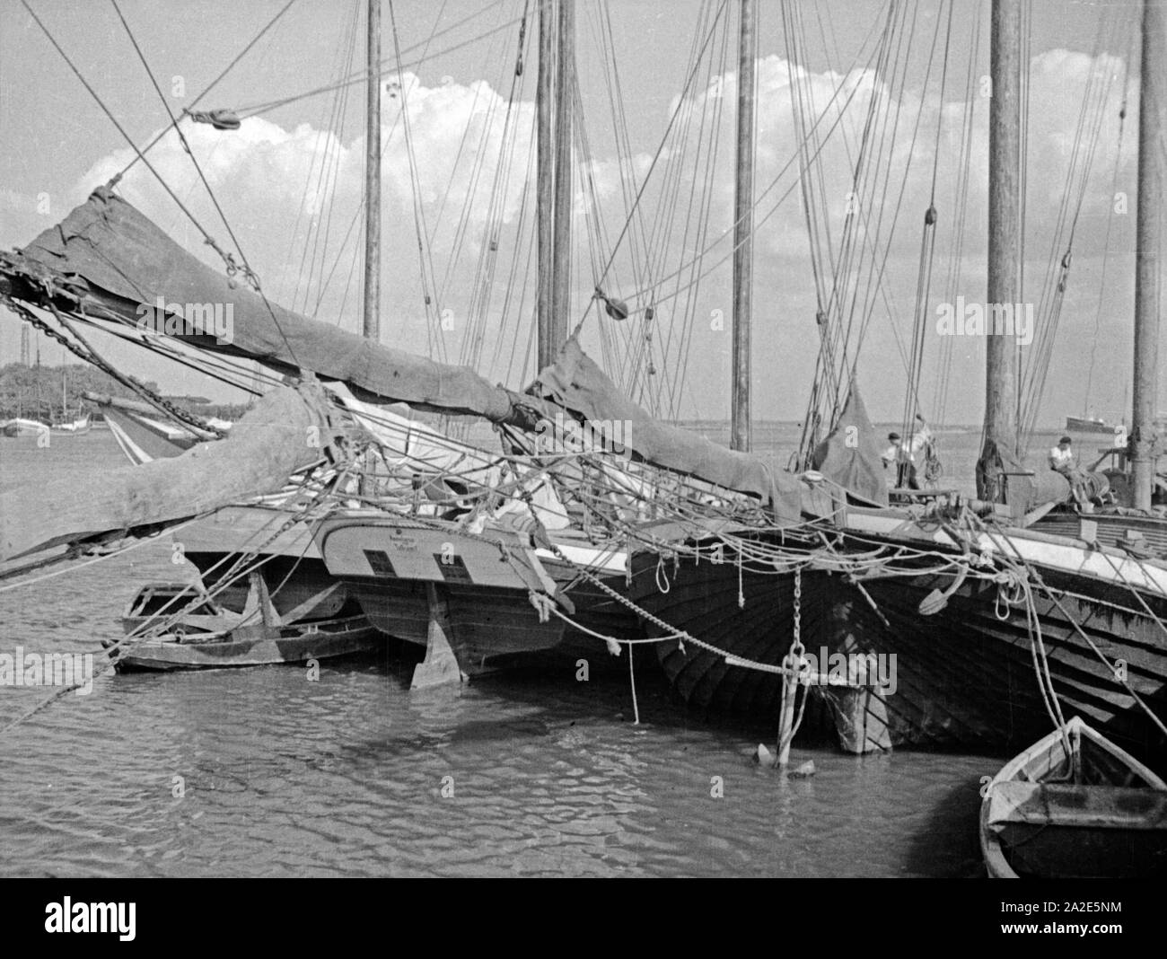 Segelboote vom Typ Lomme im Hafen von Tolkemit, Ostpreußen, 1930er Jahre. Barche a vela - il tipo è chiamato 'Lomme" - presso il porto di Tolkemit, Prussia orientale, 1930s. Foto Stock