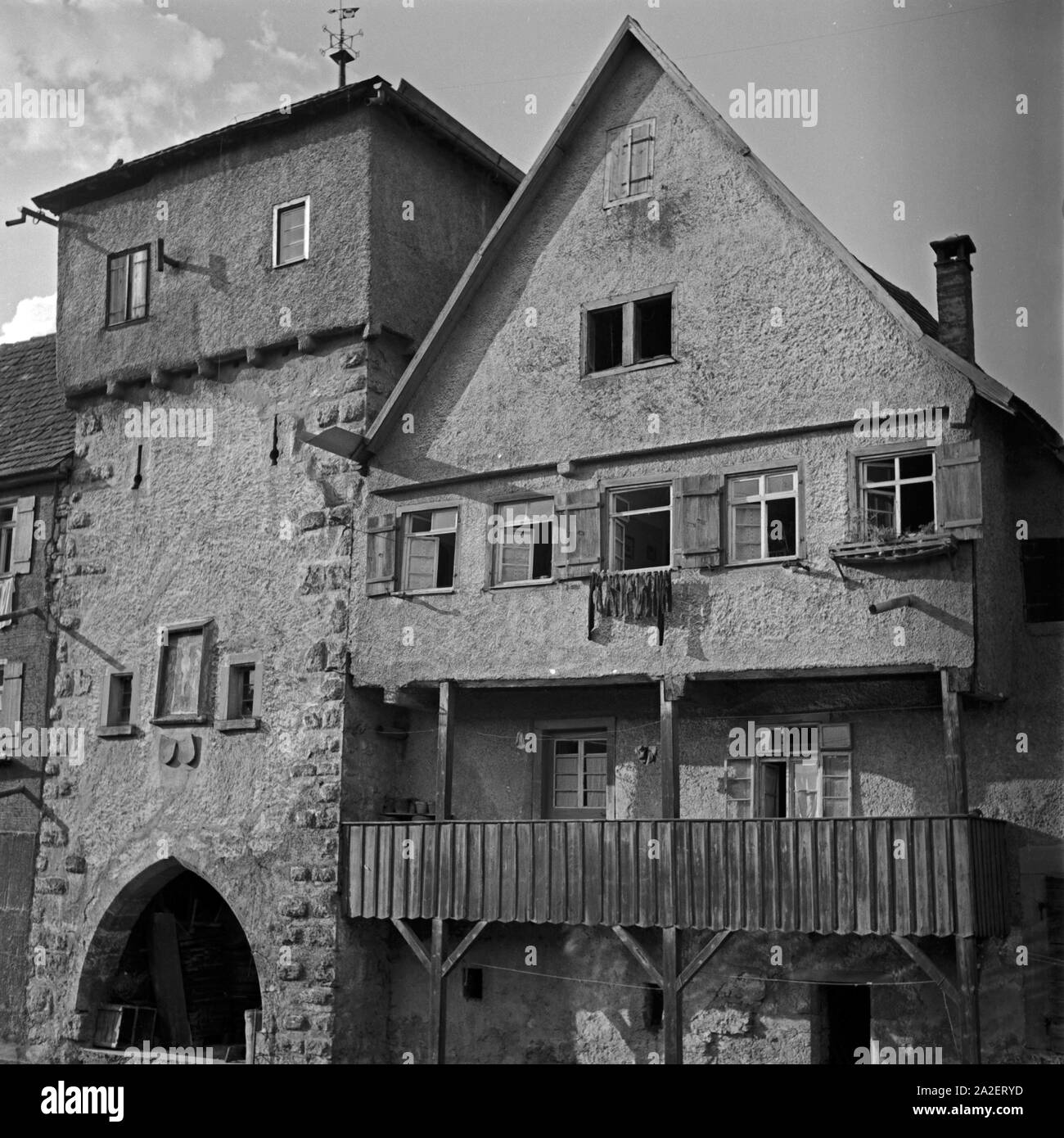 Häuserzeile in der Altstadt von Horb am Neckar, Deutschland 1930er Jahre. Vecchie case di città in città di Horb al fiume Neckar, Germania 1930s. Foto Stock