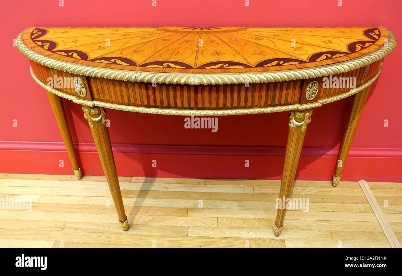 Lato ellittica tabella, John Linnell, designer, Inghilterra, c. 1775, satinwood, bronzo dorato monta - California Palace della Legione d Onore - San Francisco, CA - Foto Stock