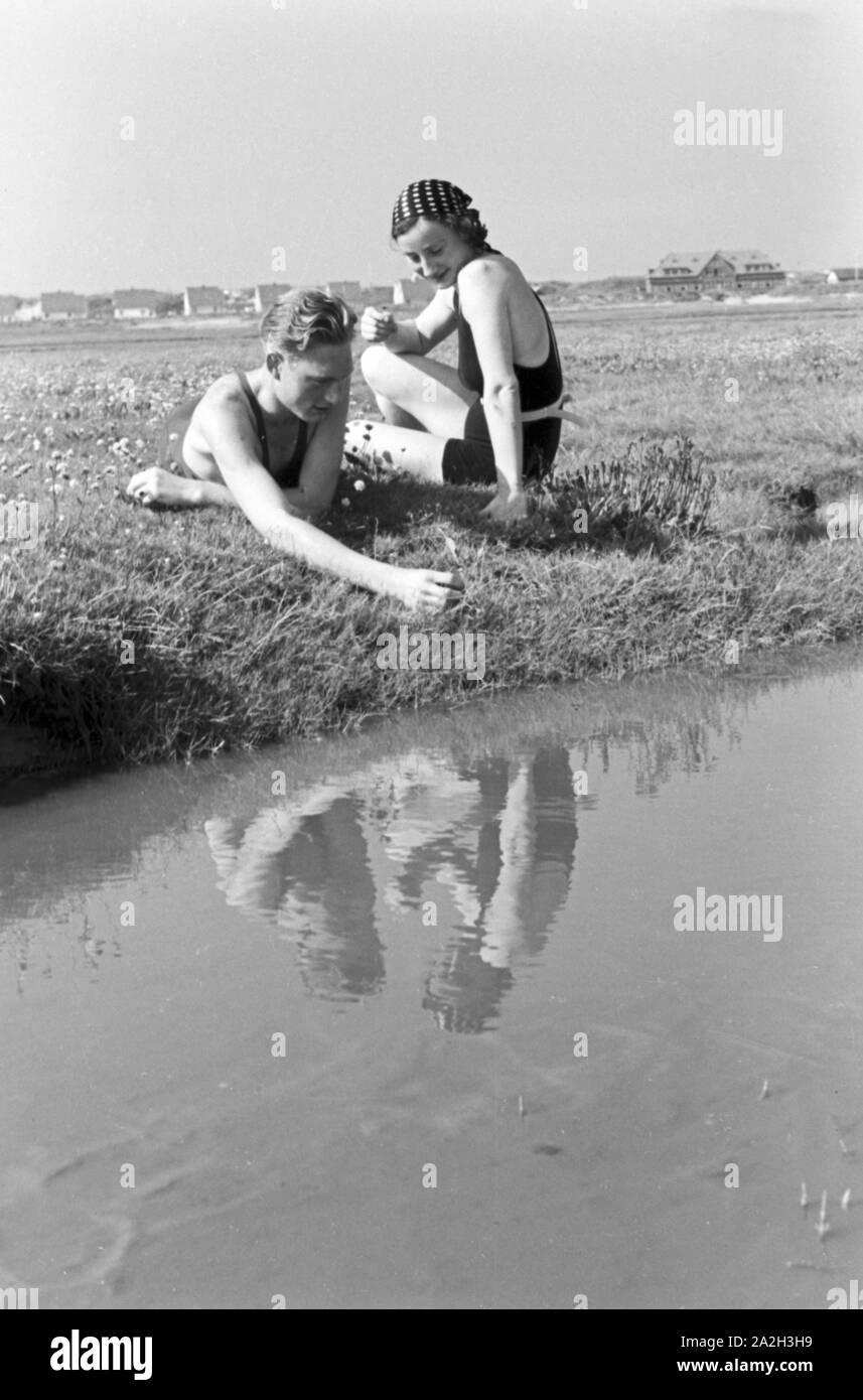 Sommerferien auf der Nordseeinsel Juist, Deutsches Reich 1930er Jahre. Vacanze estive sull'isola del Mare del Nord Juist, Germania 1930s. Foto Stock