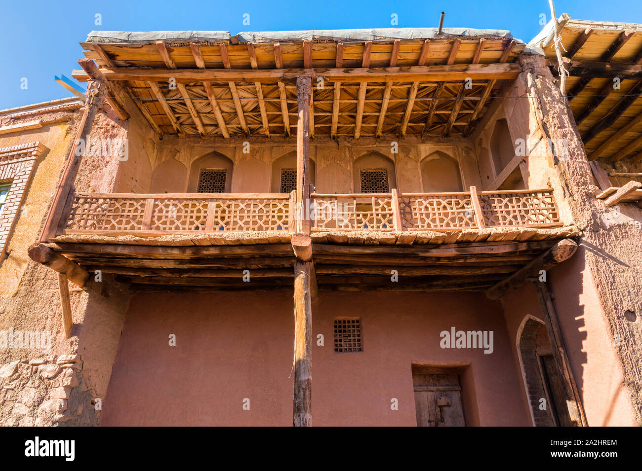 Rosso case di adobe, Abyaneh village, Esfahan Provincia, Iran Foto Stock