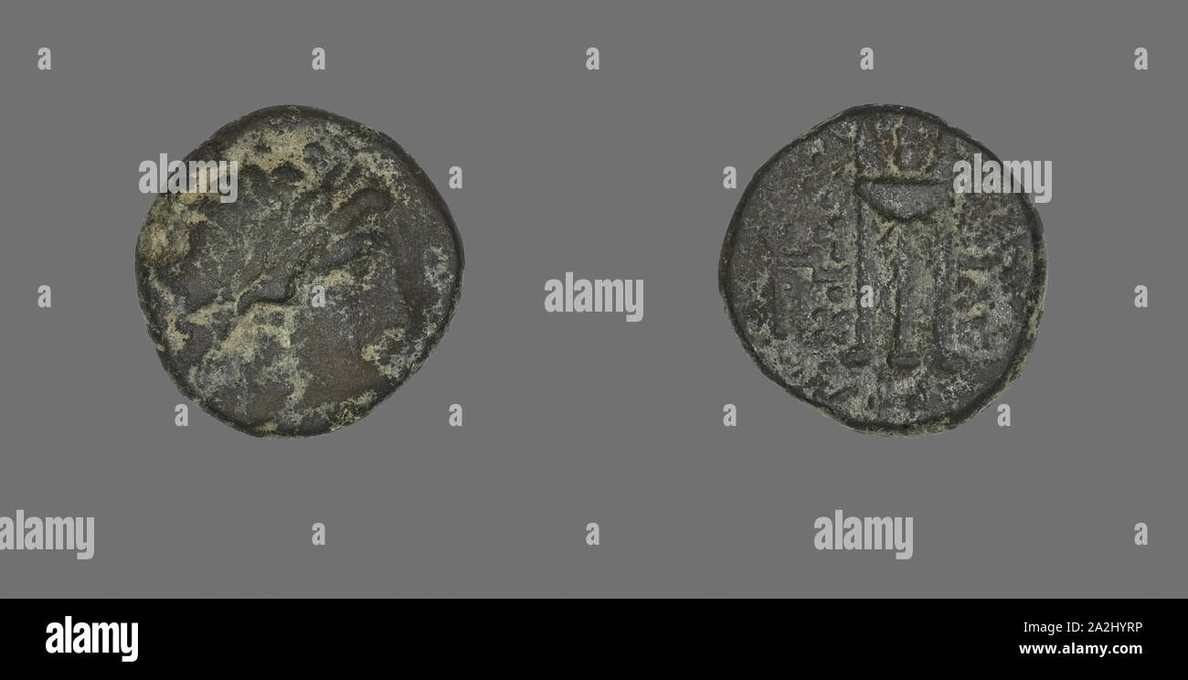 Medaglia raffigurante il dio Apollo, 261/246 BC, greco, antica Grecia, bronzo, Diam. 1,8 cm, 4,79 g Foto Stock