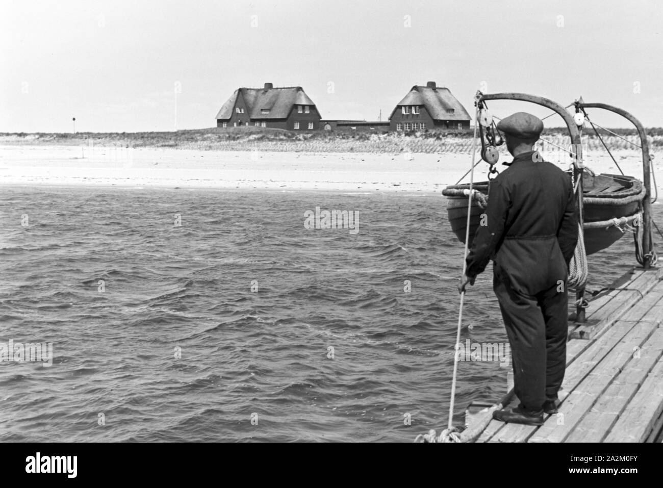 Fischer bei der Arbeit, Deutsches Reich 1930er jahre. I pescatori a lavoro, Germania 1930s. Foto Stock