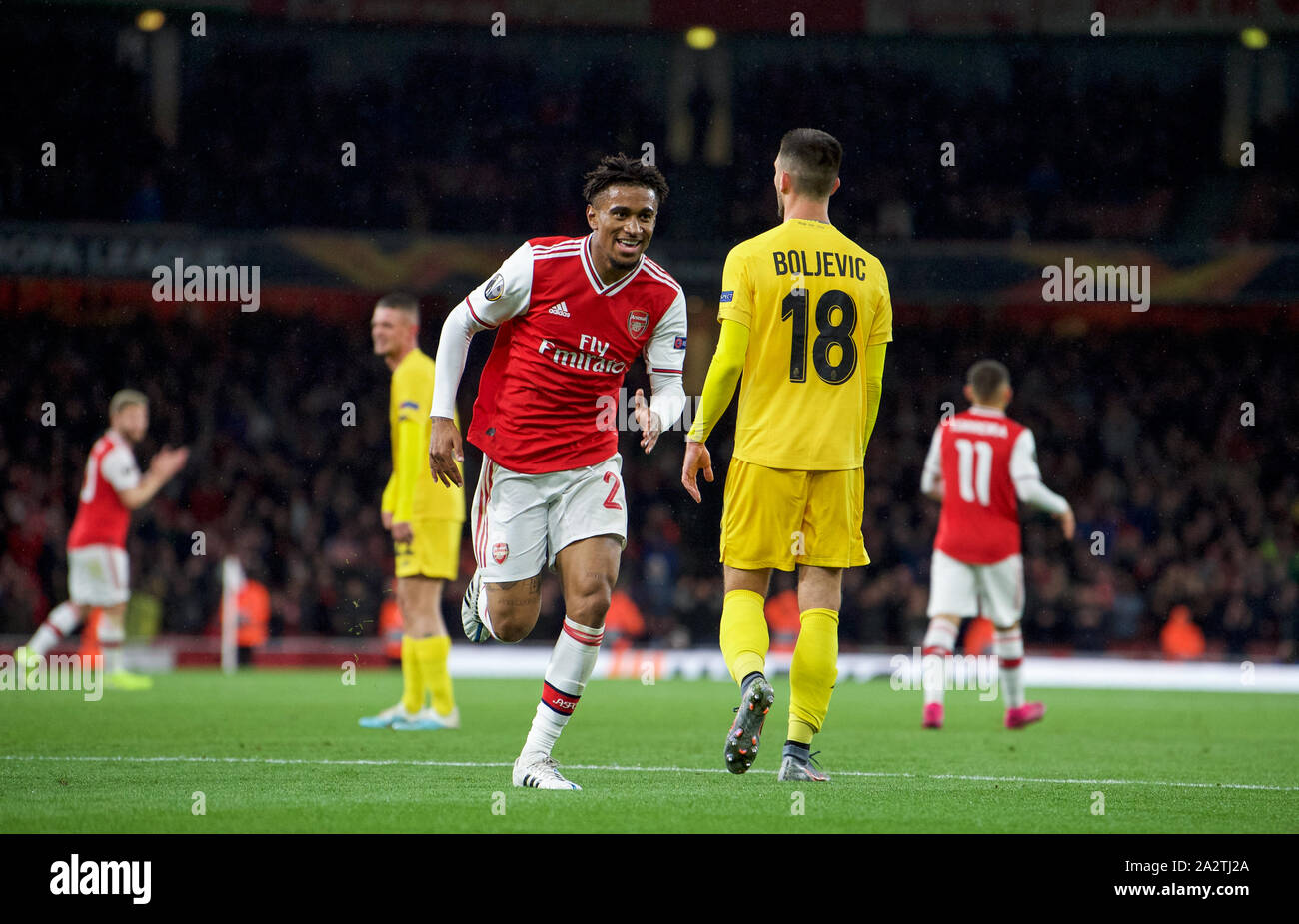 Londra, Regno Unito. 03 ott 2019. Reiss Nelson di Arsenal corre a unirsi a 3° obiettivo celebrazioni durante la UEFA Europa League match tra Arsenal e Standard Liege a Emirates Stadium di Londra, Inghilterra il 3 ottobre 2019. Foto di Andrea Aleks. Credito: prime immagini multimediali/Alamy Live News Foto Stock