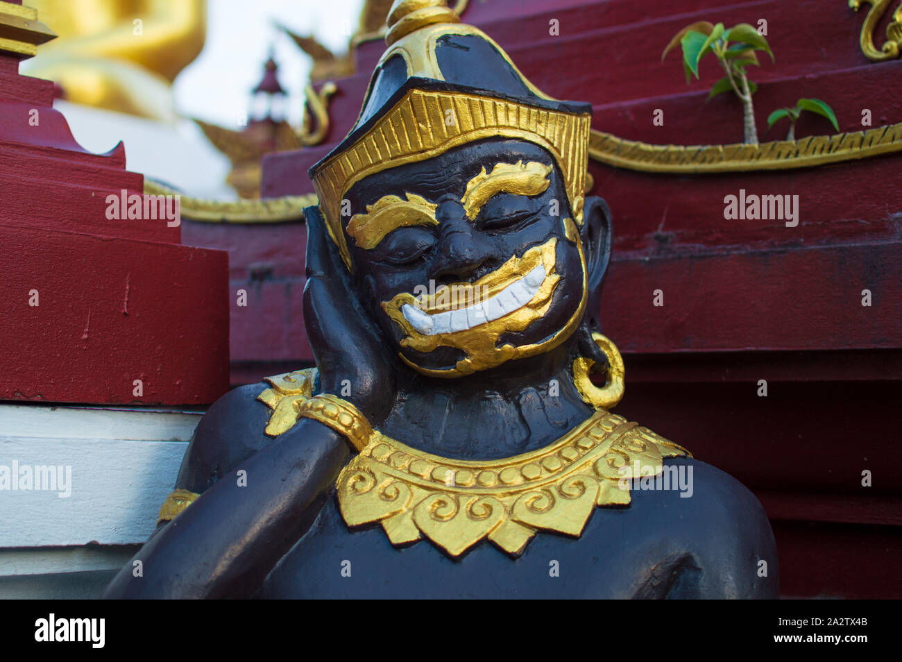 Tempio thailandese statua Foto Stock