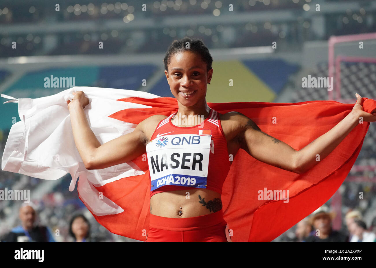 Doha in Qatar. 3° Ott, 2019. Salwa Eid Naser del Bahrain festeggia dopo aver vinto la medaglia d'oro nel femminile 400 metro finale al 2019 IAAF mondiale di atletica a Doha, in Qatar, Ottobre 3, 2019. Credito: Li pista/Xinhua/Alamy Live News Foto Stock