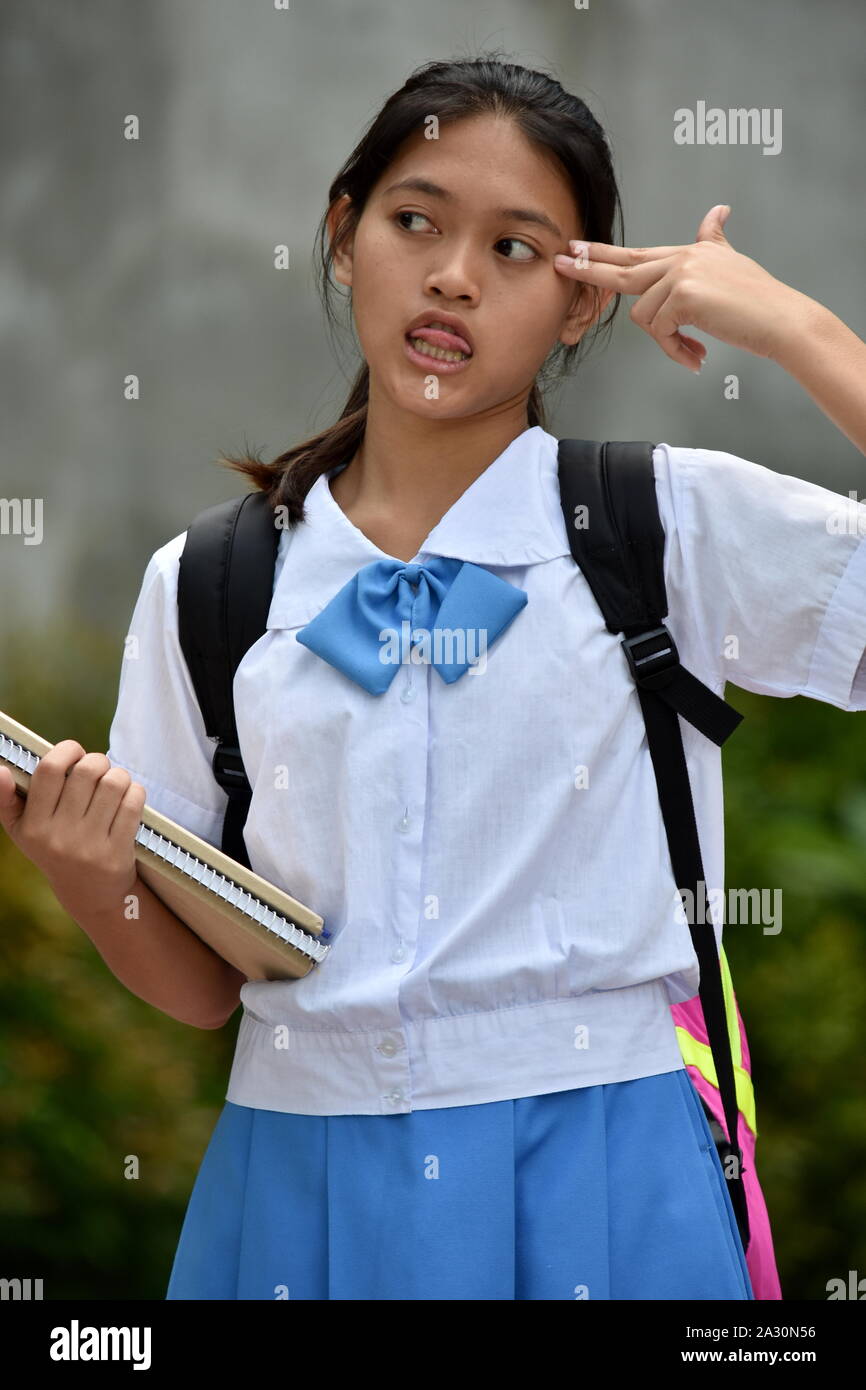 Un muto piuttosto Filipina School girl Foto Stock