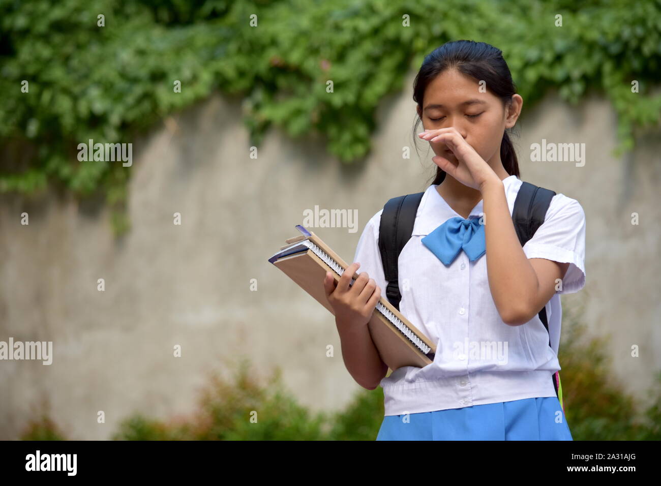 Un lacrimoso Filipina persona Foto Stock