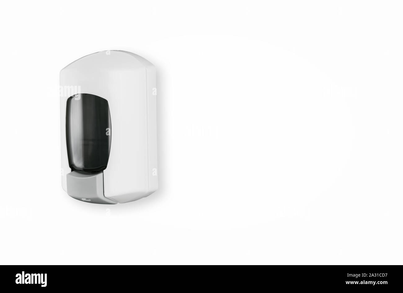 Il bianco e il liquido di ritorno lato distributore sapone piccolo di plastica montato sulla parete ricaricabili Foto Stock