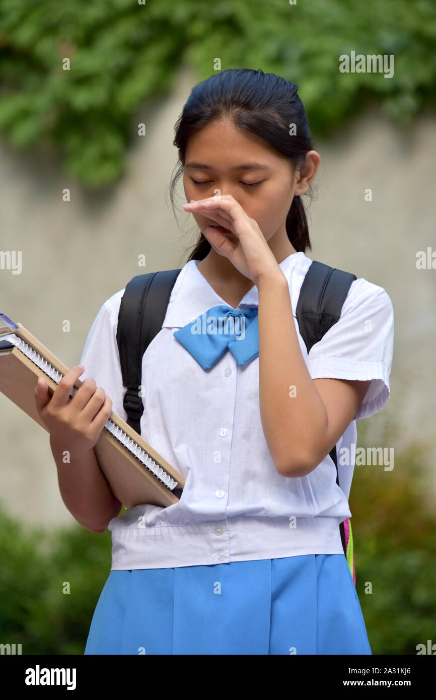 Un pianto studente femmina Foto Stock