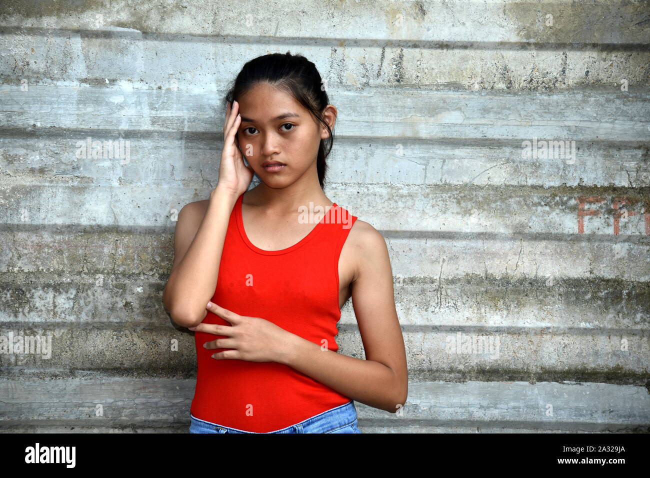 Un giovane femmina Filipina e confusione Foto Stock