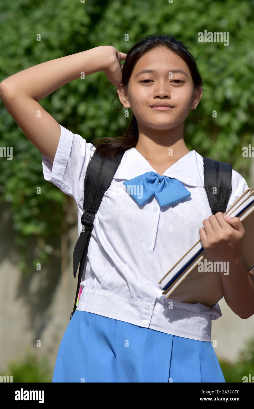 Carino Asian School girl e confusione Foto Stock