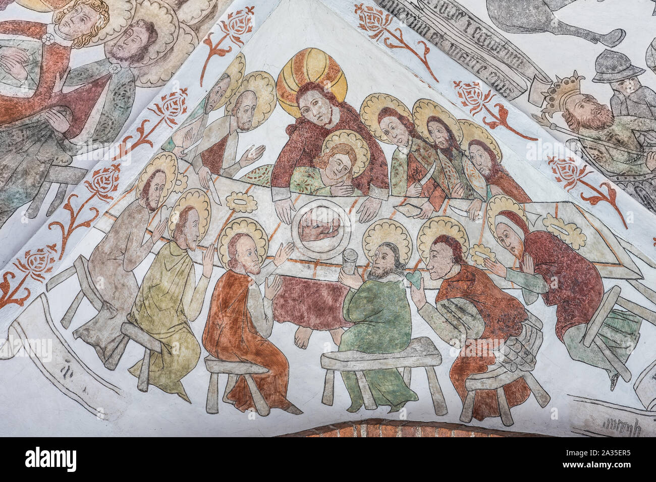 Cena del Signore con un cinghiale sulla piastra a muro dipinto da circa l'anno 1500 nella chiesa di Santa Maria, Elsinore, Danimarca, 14 maggio 2019 Foto Stock