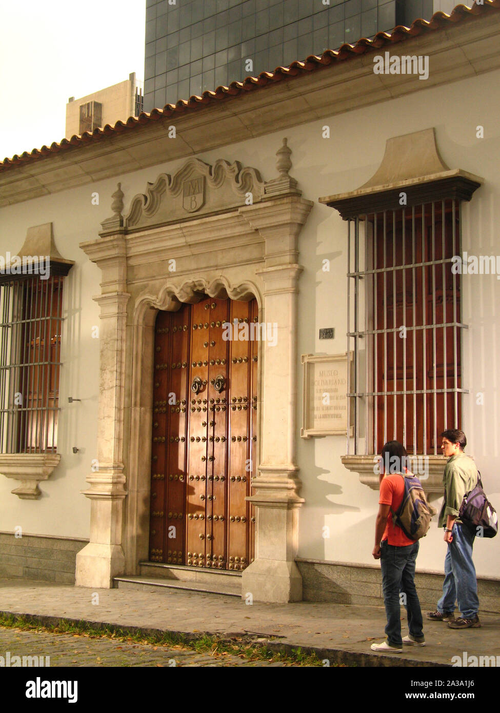 La gente a piedi nel centro storico, Simon Bolivar il liberatore natali nel centro cittadino di Caracas Venezuela Foto Stock