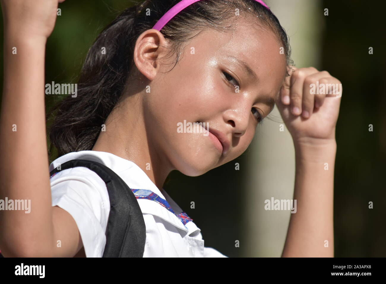 Filipina muscolare una studentessa con i notebook Foto Stock