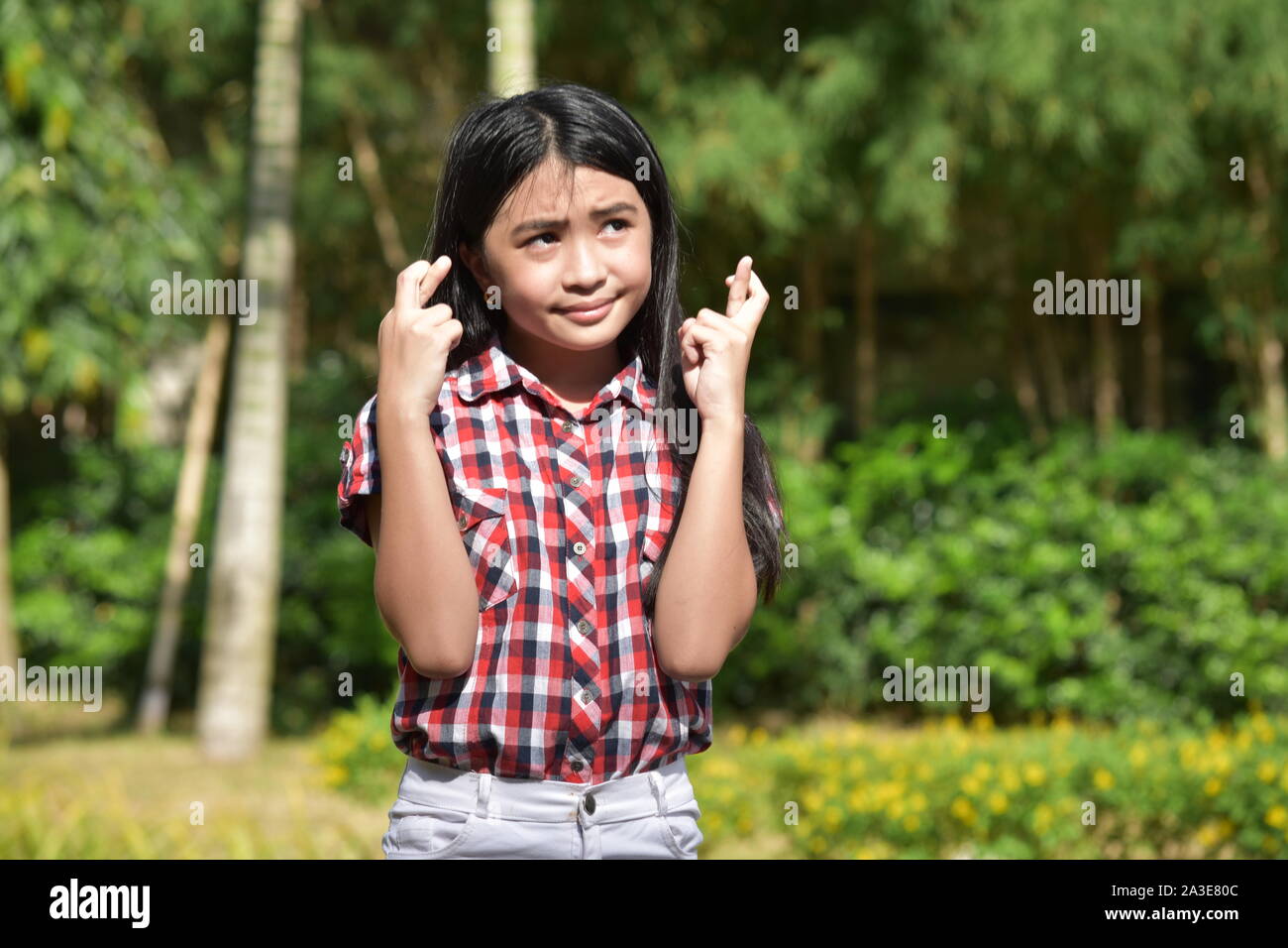 La fortuna di un carino Diverse Girl Preteen Foto Stock