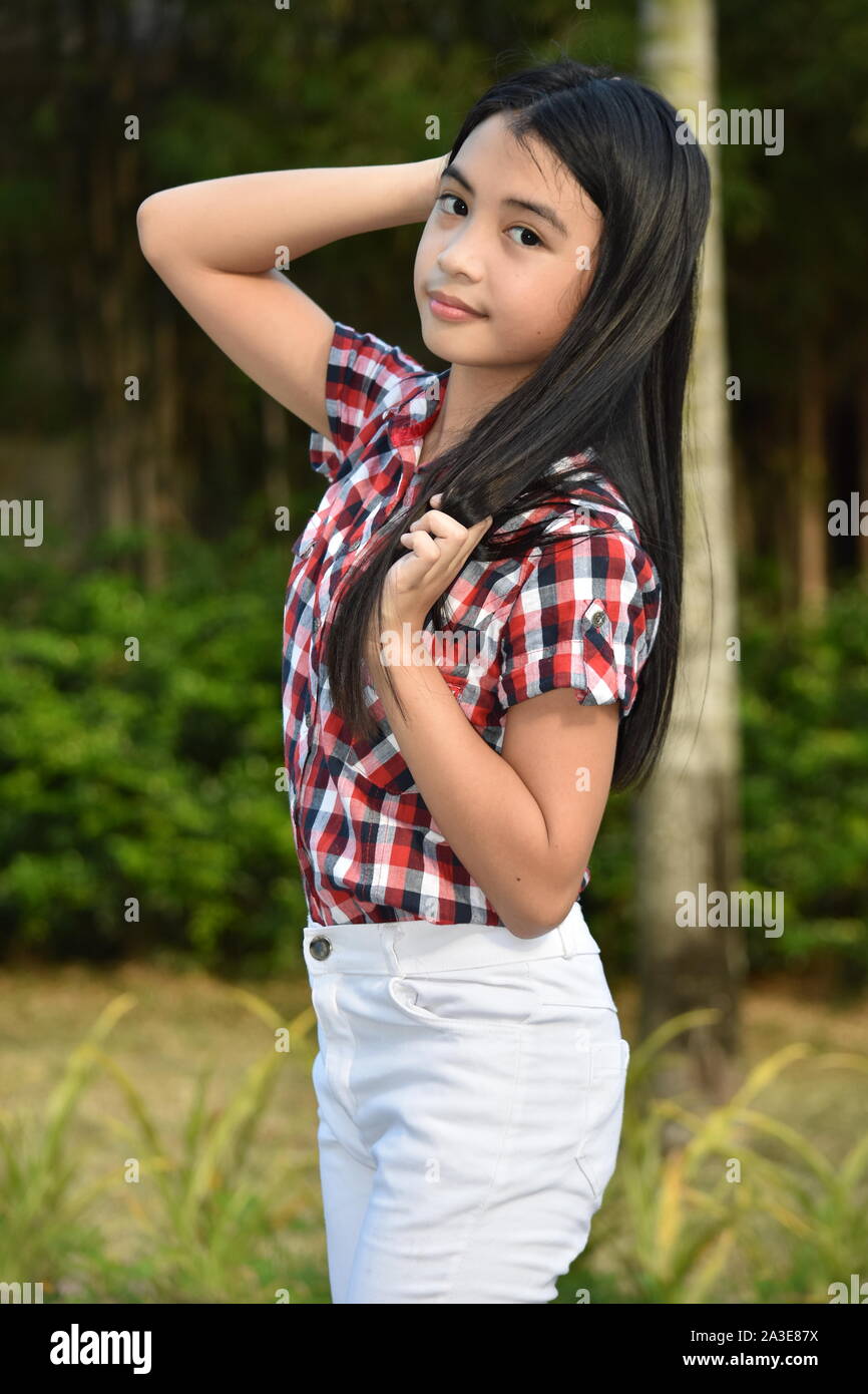 Un simpatico Petite femmina Foto Stock