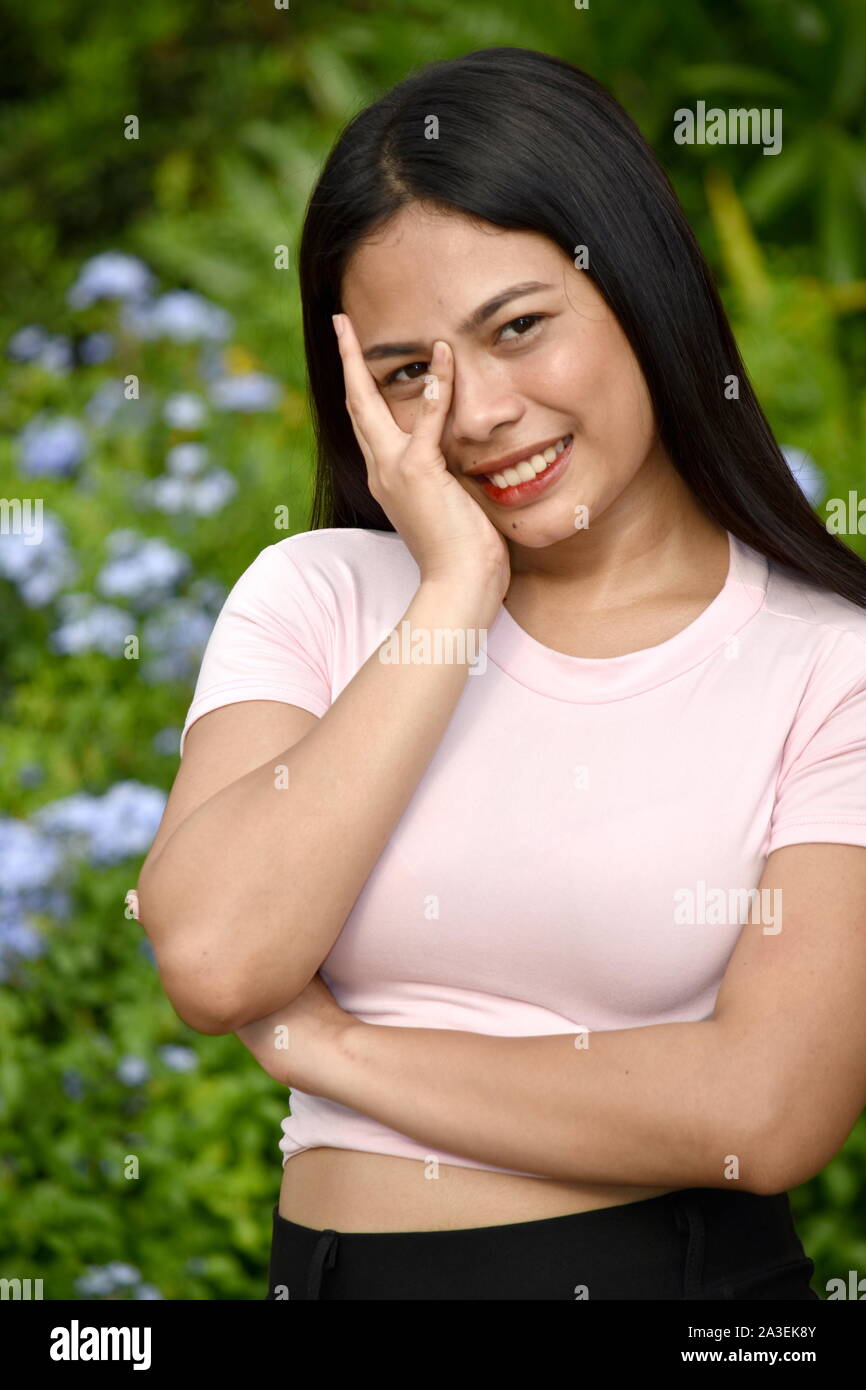 Una timida persona bella Foto Stock