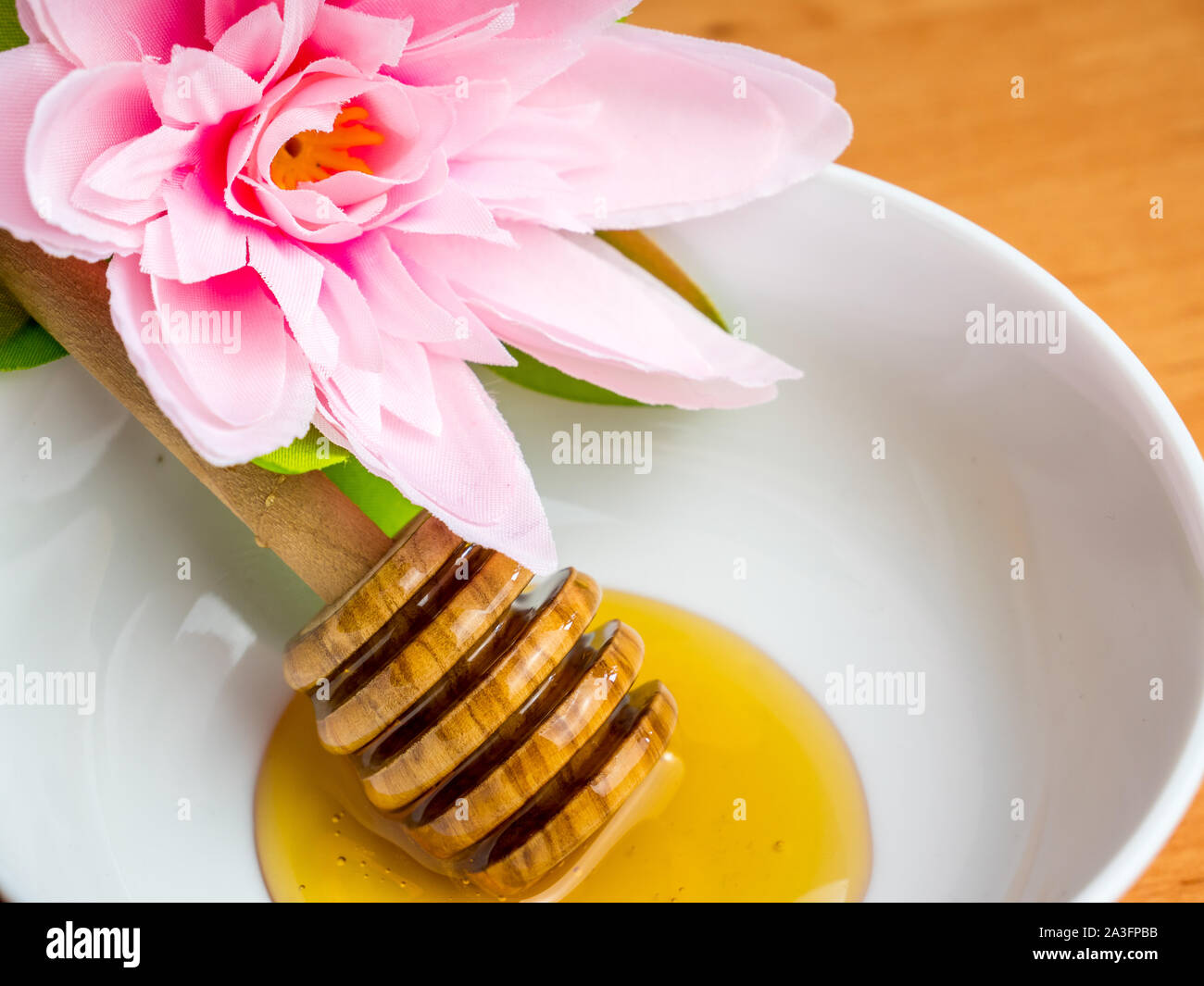 Cura della pelle con miele Foto Stock