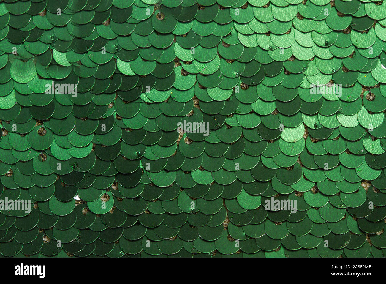 Un panno verde con paillettes in una vista ravvicinata Foto stock - Alamy