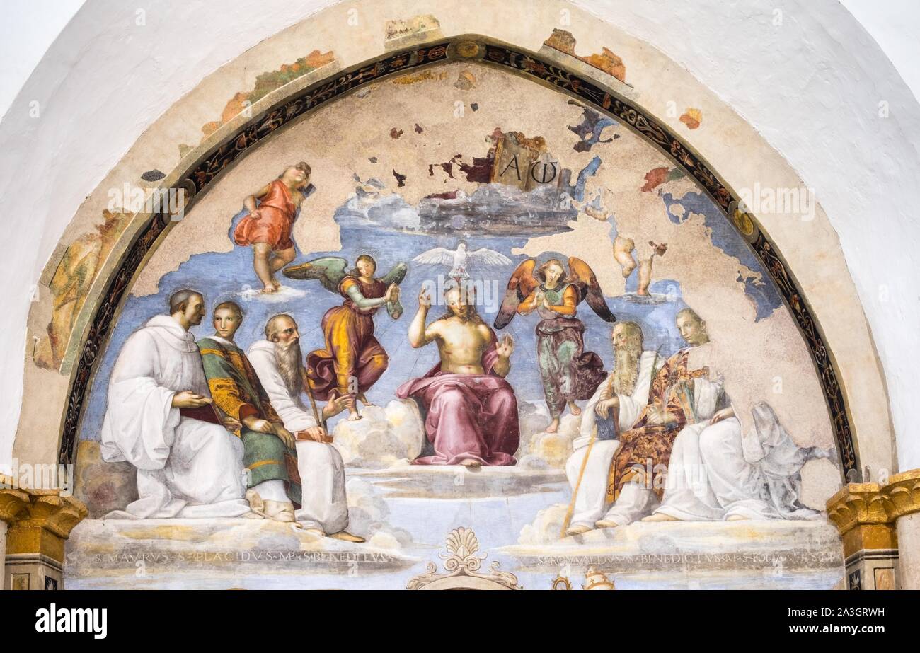 Trinità con i Santi Benedetto, Mauro, Placidus, Romauld ed i martiri Benedetto e Giovanni, affresco di Raffaello Santi chiamato Raphael, 1505, oratorio Foto Stock