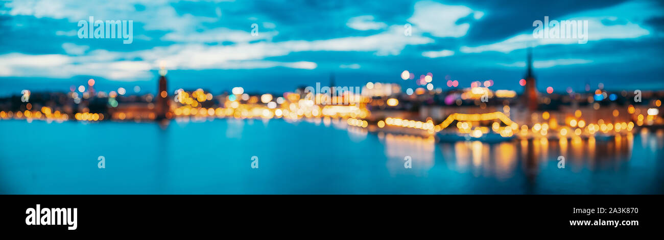 Stoccolma, Svezia. Lo Skyline di notte Abstract Boke Bokeh sfondo. Sfondo di design. Panorama Vista panoramica. Foto Stock