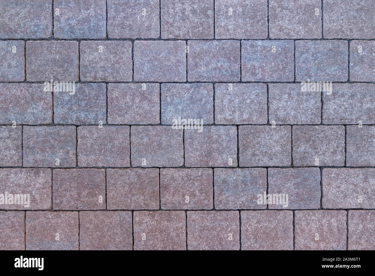 Modello di piazza, rossiccio e bluastri pietre per pavimentazione Foto Stock
