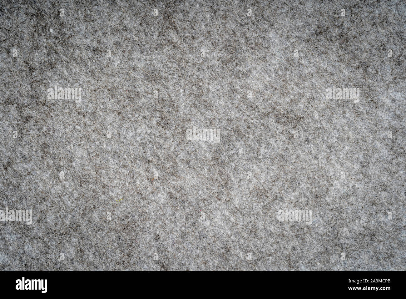 Grigio chiaro tessuto a maglia di fibre sintetiche textured background. Grigio tessuto a maglia texture. Sfondo con delicato motivo rigato, chiudi Foto Stock