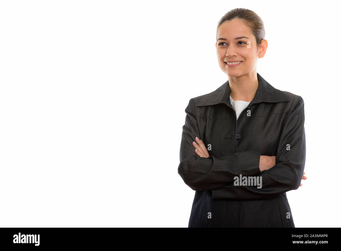 Studio shot di giovane imprenditrice felice sorridente e pensare wi Foto Stock