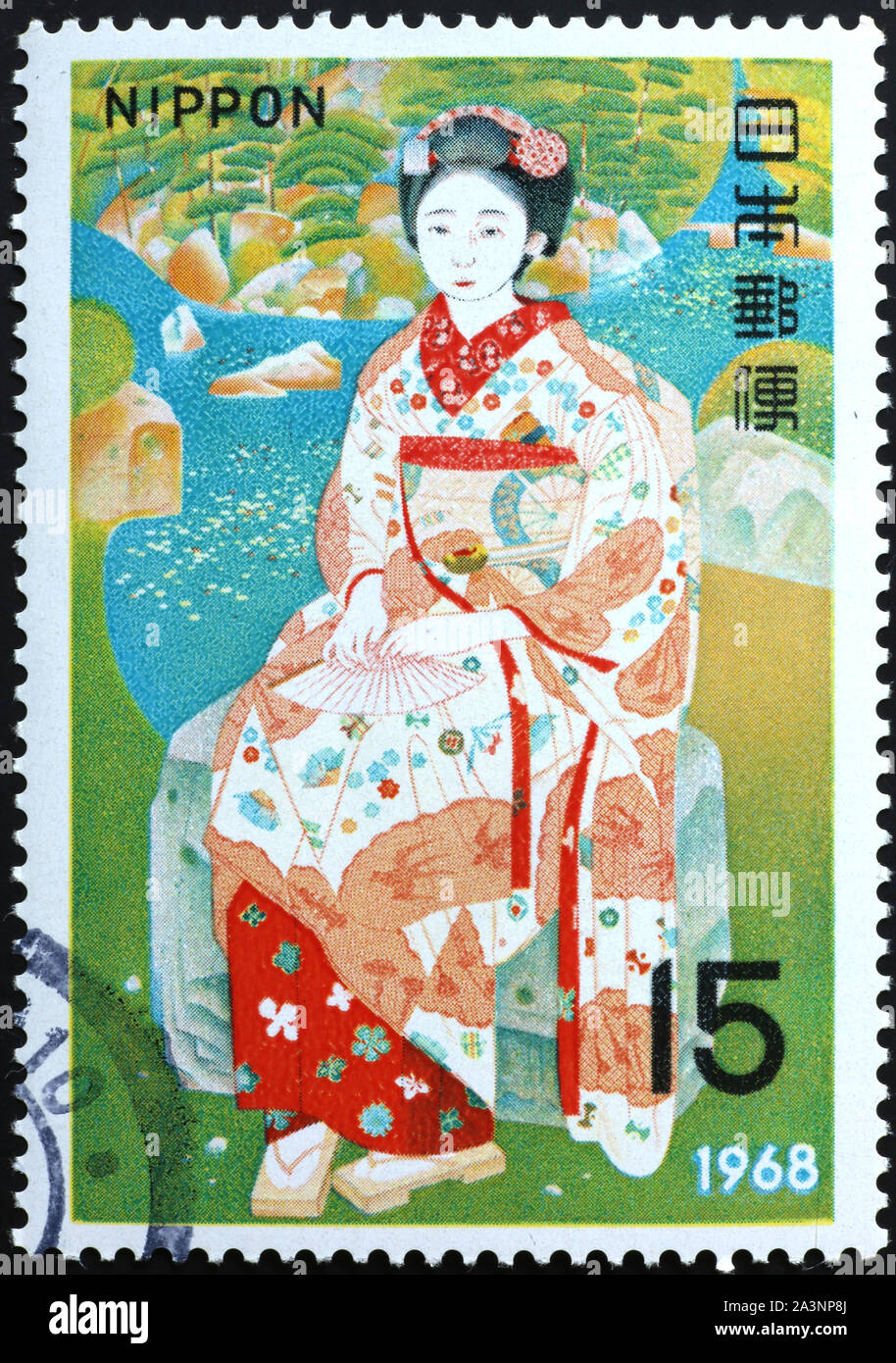Donna Giapponese con kimono sul francobollo Foto Stock