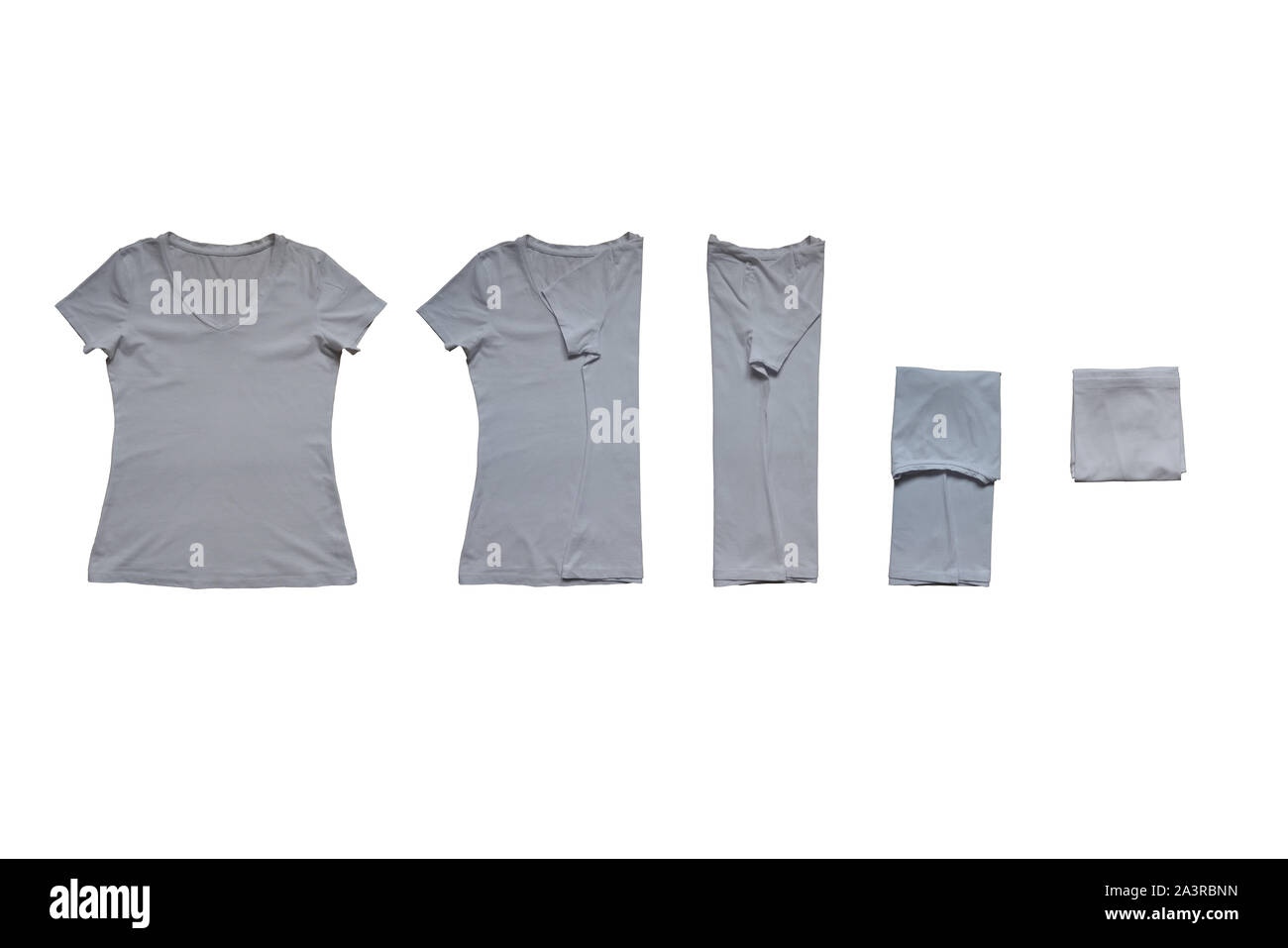 Ripiegato t-shirt set. Sfondo bianco e shirt design. Foto Stock