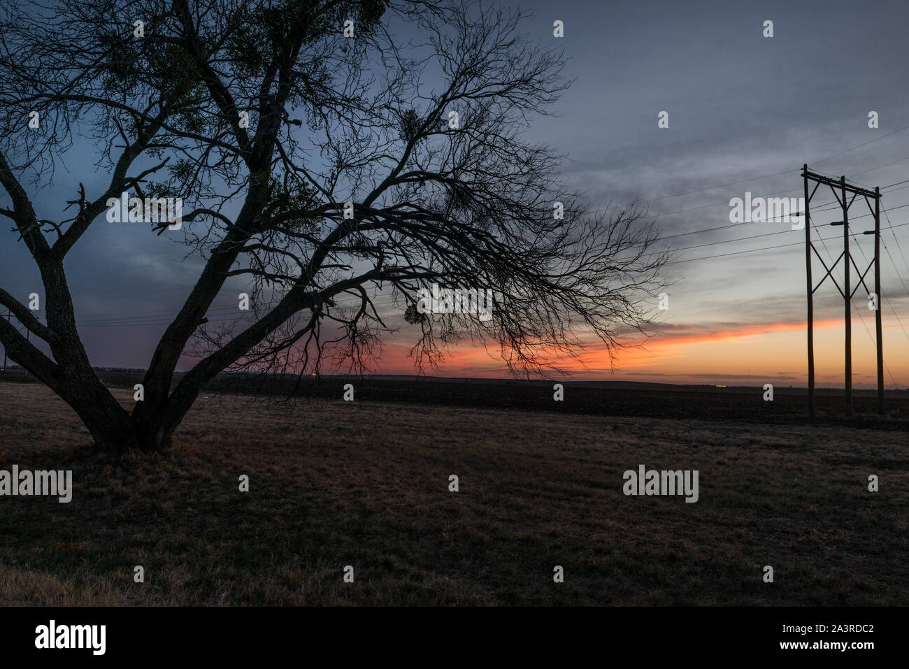 La scena del tramonto nelle zone rurali di Tom Green County, Texas, a nord-est di San Angelo Foto Stock
