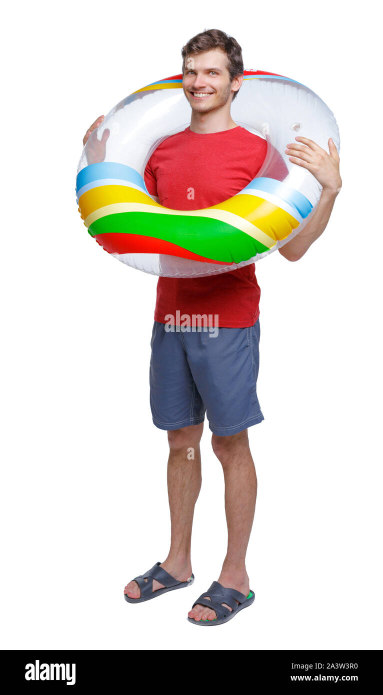 Vista frontale di un uomo in pantaloncini corti con un cerchio gonfiabile. guy sulla spiaggia. Vista posteriore di raccolta persone. vista posteriore di persona. Isolato su bianco b Foto Stock