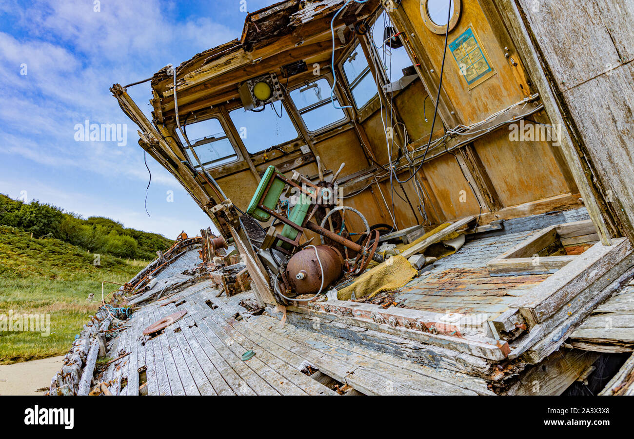 Abbandonata la pesca irlandese barca realt Na Mara, Stella del mare, Cruit Island, County Donegal, Irlanda sul selvaggio modo atlantico Foto Stock