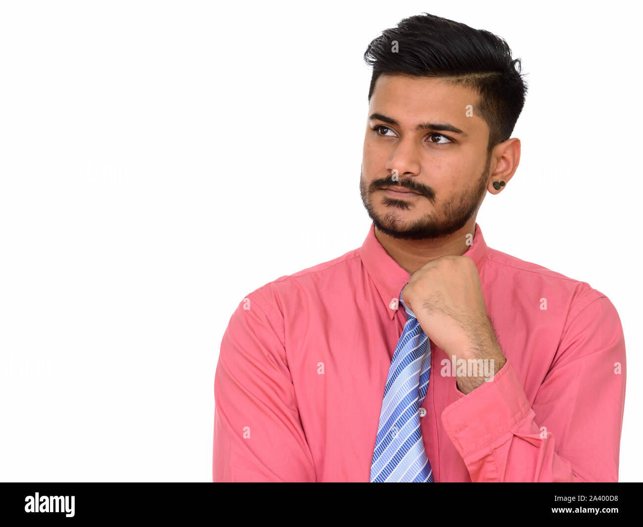 Bel giovane imprenditore indiano pensando e progettando Foto Stock